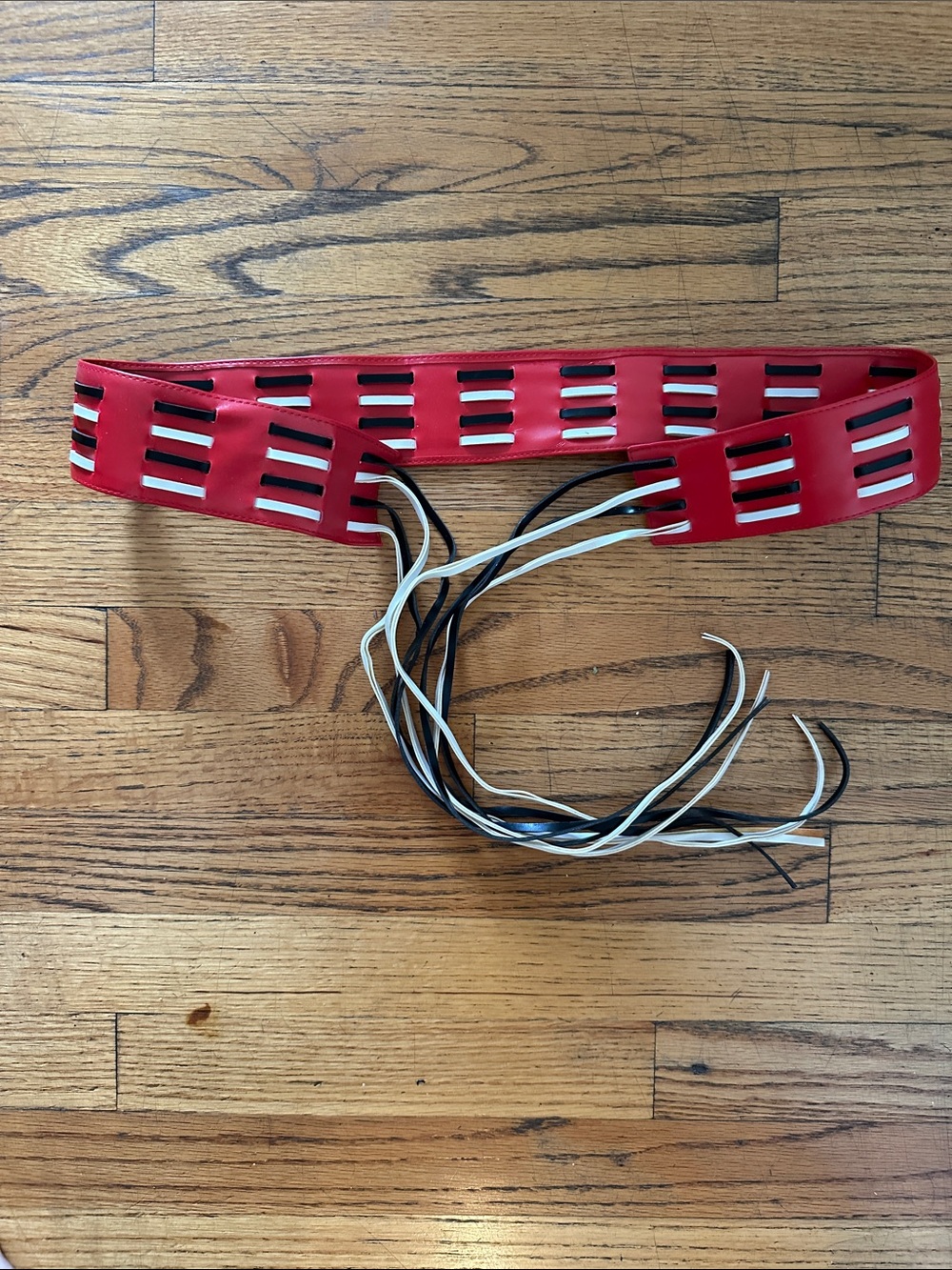 Red Men's Lace-Up Waist Belt with Black and White Tassels